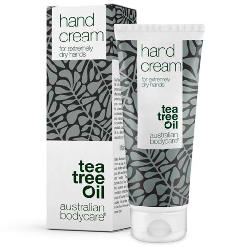 En håndkremrør og eske som viser tea tree olje for tørre hender fra Australian Bodycare.