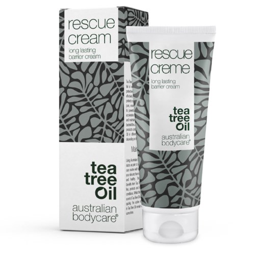 En tube og eske med rescue krem med tee tree-olje fra Australian Bodycare. Enkel grå og hvit design.