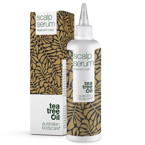 En vit flaska med scalp serum med en pipett bredvid sin förpackning, båda med svart-guld lövmönster och grön text.