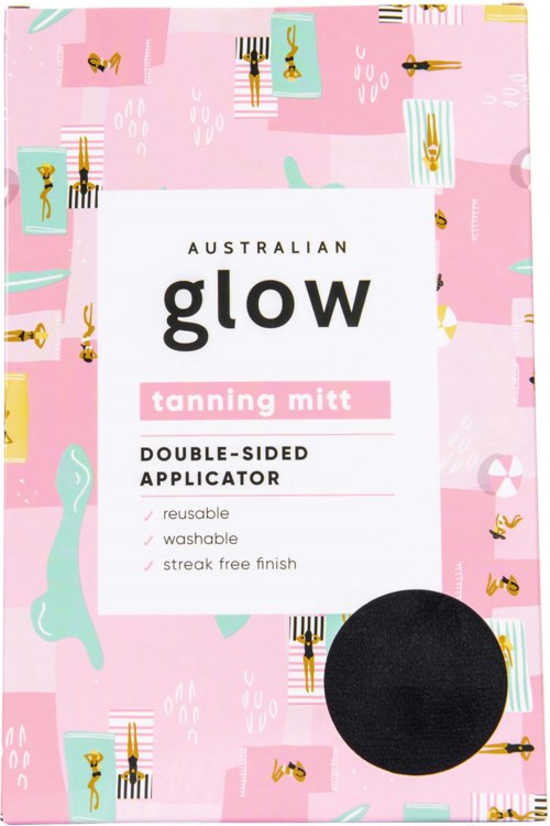 Różowe opakowanie z ilustracjami plażowymi i czarnym kołem na rękawicę do opalania. Tekst zawiera 'Australian glow' i 'dwustronny aplikator.'
