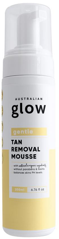 En hvit flaske med pumpe merket 'Australian Glow gentle tan removal mousse' i svart og gult tekst.