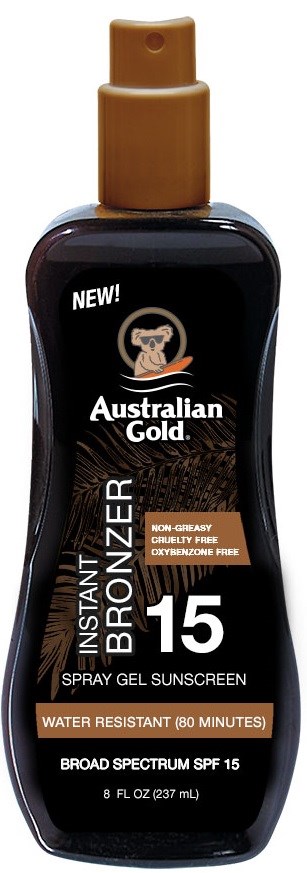 En flaska med Australian Gold Instant Bronzer spray gel solskyddsmedel med SPF 15, vattentålig i 80 minuter, i ett mörkt fold