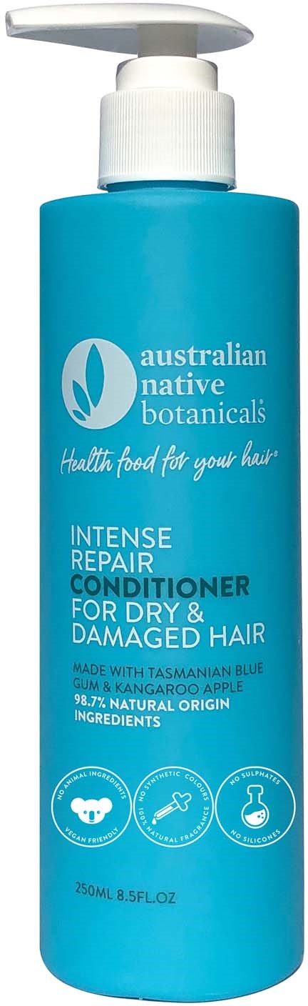 En blå flaska med Australian Native Botanicals balsam för torrt, skadat hår med pump.