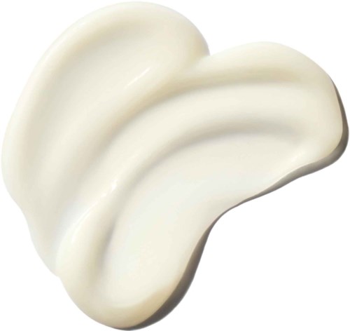 En vit, slät, blobliknande substans, möjligen kräm eller lotion, med böjd, glansig yta.