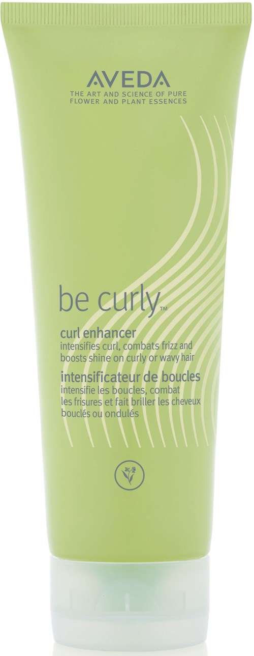 En grön tub märkt 'Aveda be curly curl enhancer' för att stärka och forma lockar.