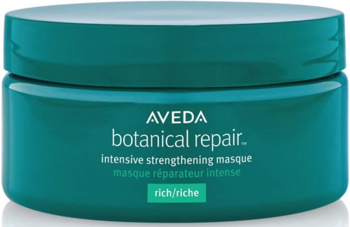 Turkusowe opakowanie Aveda botanical repair intensywnie wzmacniająca maseczka z białym i zielonym tekstem na etykiecie.