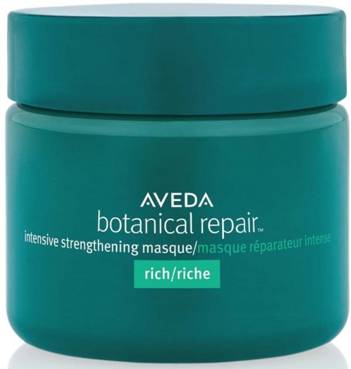 Niebieska pojemnik od Aveda botanical repair intensywnie wzmacniającej maski oznaczony jako bogata. Ma okrągły kształt i dopasowaną pokrywkę.