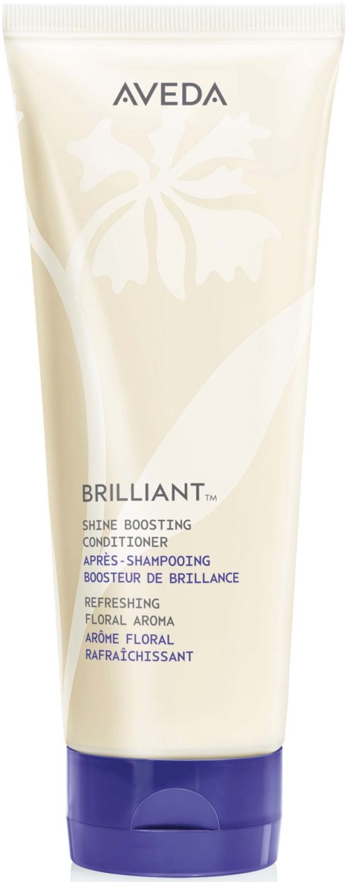 En hvid tube med Aveda Brilliant Shine Boosting Conditioner med lilla låg og blomsterdesign på forsiden.