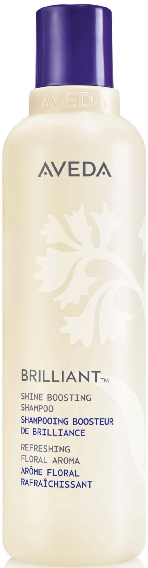 En hvid flaske med Aveda Brilliant shine boosting shampoo med mørk lilla låg og let floral design.