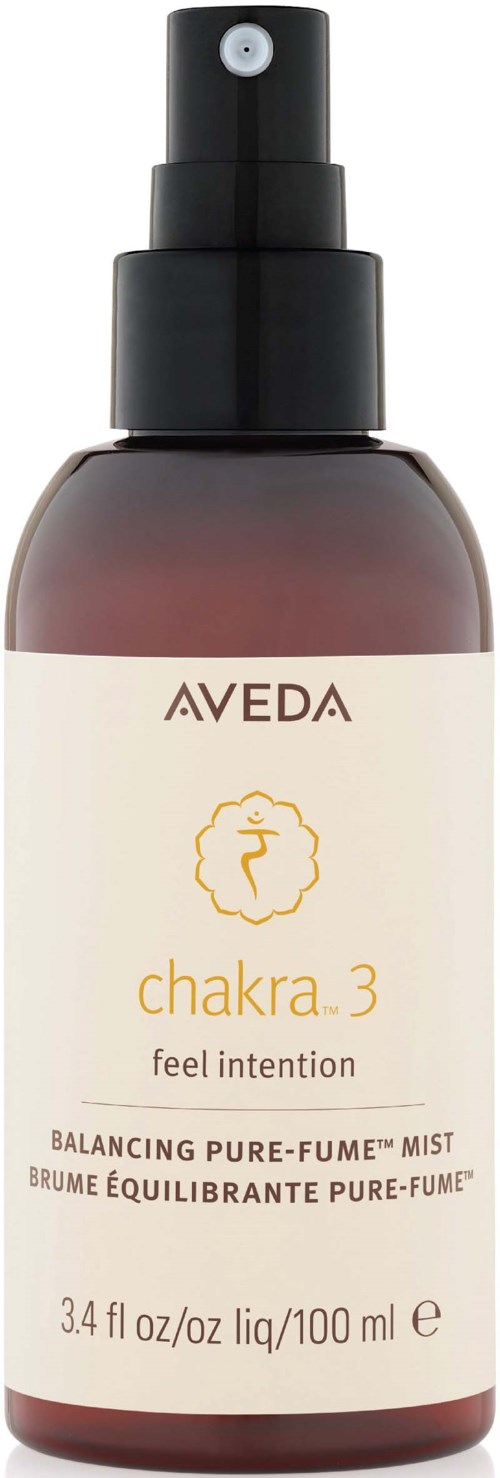 Aveda Chakra 3 suihkepullo, jossa suihkuväline ja etiketti, joka kertoo tuotteen nimen ja tarkoituksen.