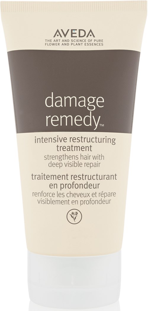 En tube med Aveda Damage Remedy hårbehandling for å styrke og reparere håret.
