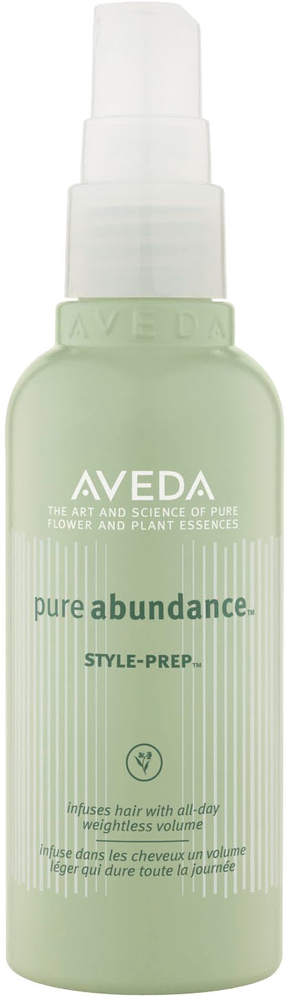 A light green spray bottle labeled "Aveda" with white lettering, designed to be used on hair.