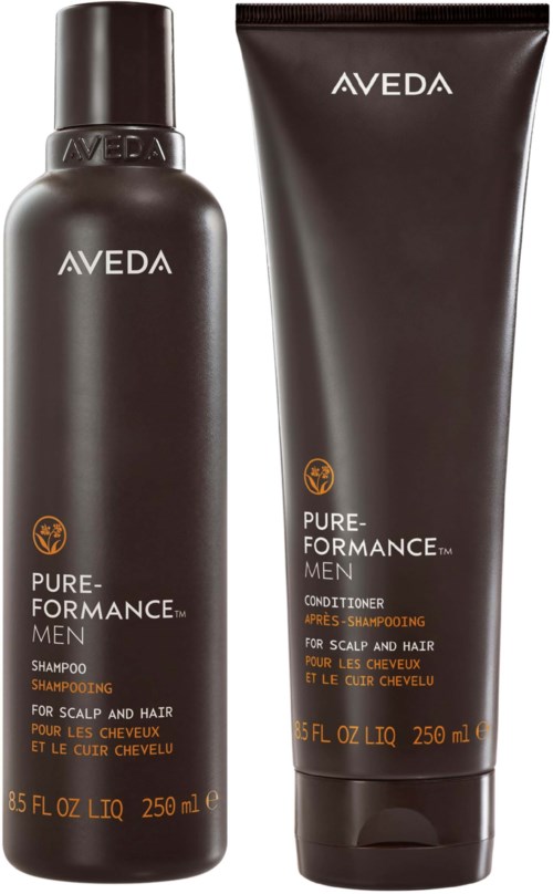 En sort flaske og et sort rør med Aveda Pure-Performance Men hårplejeprodukter, mærket til hovedbund og hår.
