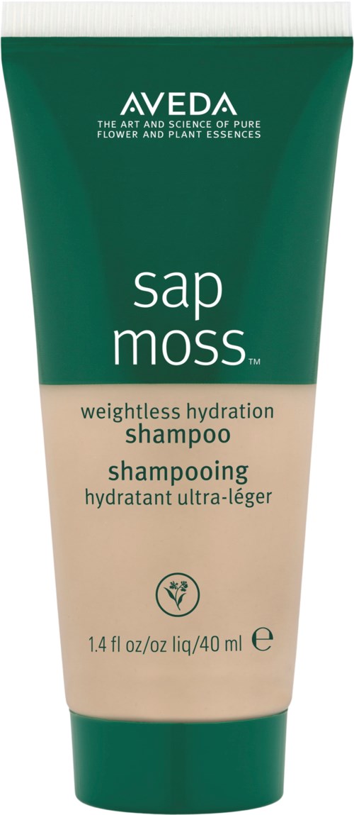 A green and beige shampoo tube labeled 'Aveda' with 'sap moss' and 'weightless hydration' written on it.