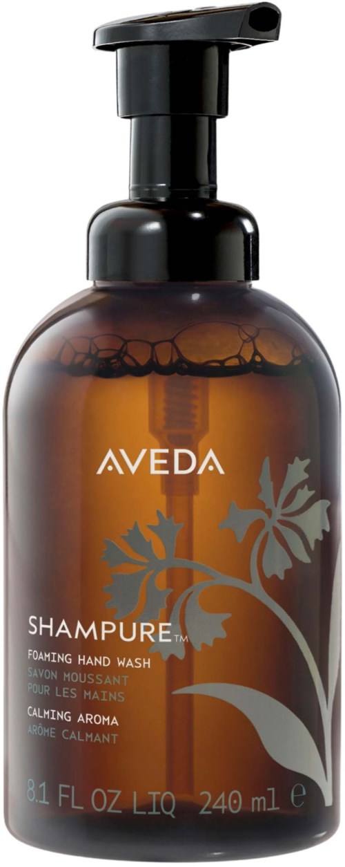 En brun flaske med Aveda shampoo med sort pumpe, mærket som beroligende håndvask, indeholder 240 ml.