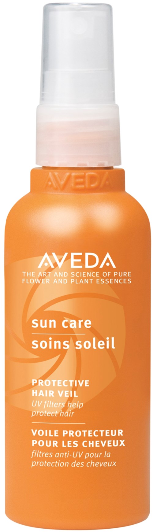 En orange sprutförpackning märkta Aveda Sun Care med ett genomskinnligt lock, avsedd för att skydda håret mot solskador.