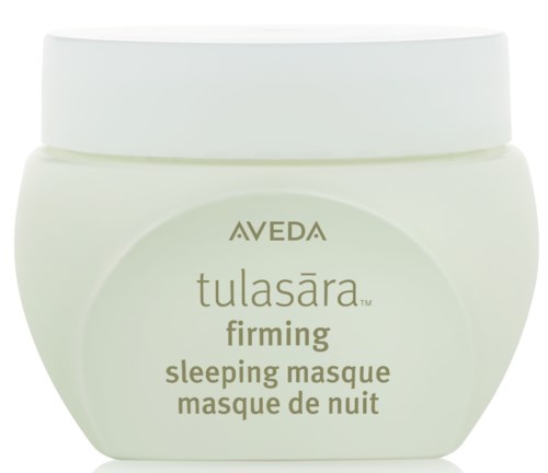 En lys grønn krukke med Aveda Tulasara firming sleeping masque. Hvit lokk, enkelt etikettdesign, tekst på engelsk og fransk.