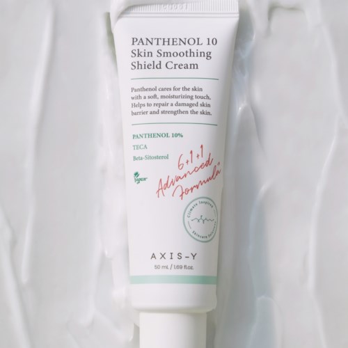 A white tube of skin cream labeled Panthenol 10, for skin soothing and repair, placed on a white surface.