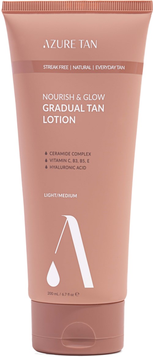 A pink tube of Azure Tan skincare lotion labeled 'Nourish & Glow Gradual Tan Lotion' with ingredients and usage details.