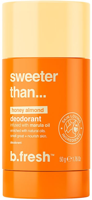 En orange deodorantbehållare med gul kork. Etiketter säger "sweeter than... honey almond" och "b.fresh."