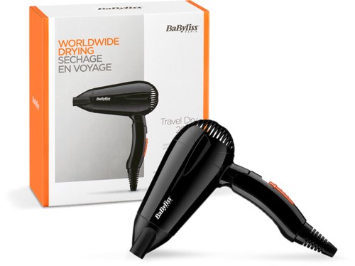Sort rejsehårtørrer med orange accenter, foran dens orange og hvide æske, mærket 'World Wide Drying' af BaByliss.