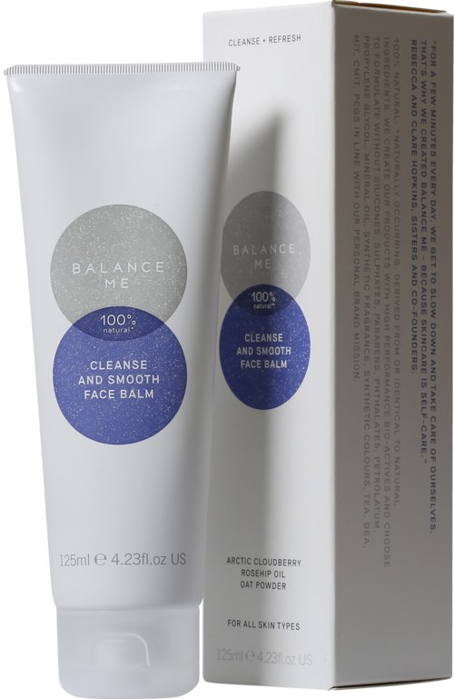 En vit tub med ansiktsbalsam bredvid dess förpackning, märkt 'Balance Me' och 'Cleanse and Smooth Face Balm'.