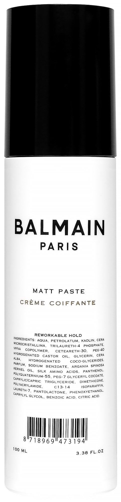 En vit flaska med svart lock, märkt 'BALMAIN PARIS', innehåller matt hårpast.