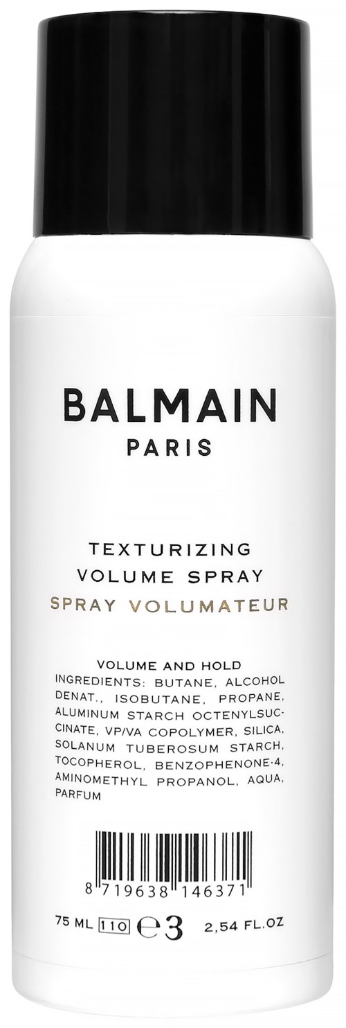 A white spray bottle with a black cap labeled 'BALMAIN PARIS Texturizing Volume Spray'.
