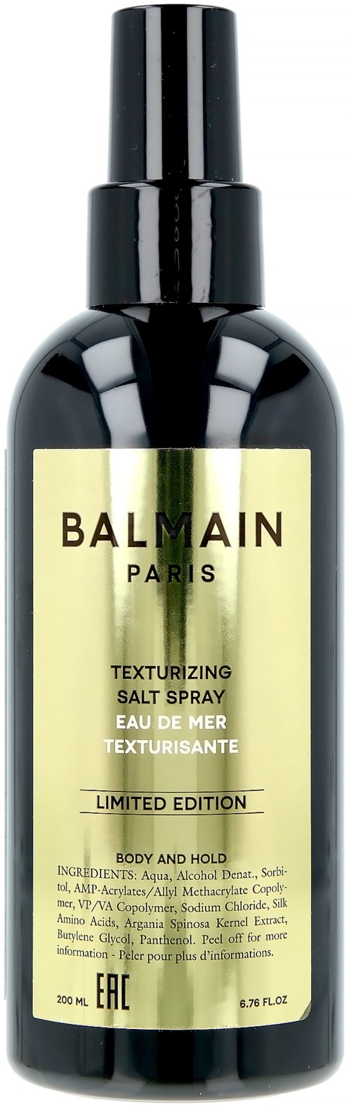 En svart flaske med spraylokk, merket 'Balmain Paris Texturezing Salt Spray', begrenset utgave for kropp og hold.