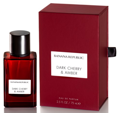 A red perfume bottle with a black cap next to a matching red box, labeled "Banana Republic Dark Cherry & Amber."
