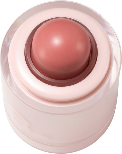 En rund, rosa makeup blush eller ögonskugga med en glänsande yta i ett vitt behållare.