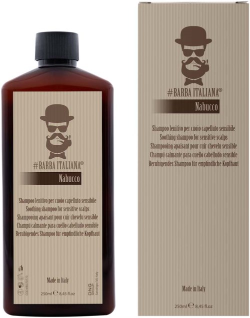 En brun flaske med herreshampoo med en etikett som viser en skjegget mann med hatt og solbriller, og tekst på flere språk.