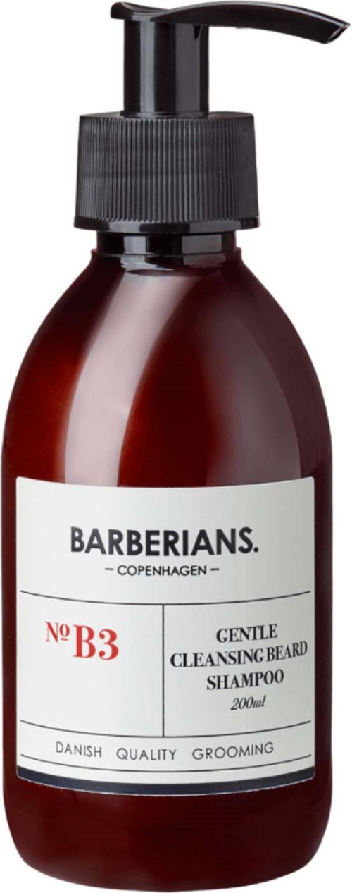 Ruskea pumppupullo, etiketti 'Barberians Copenhagen' ja 'Gentle Cleansing Beard Shampoo.'