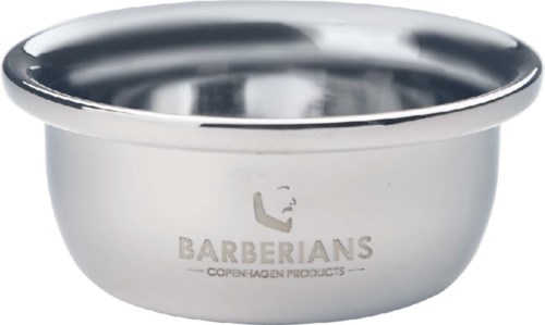 Een glanzende metalen kom met een logo die zegt "Barberians Copenhagen Products".