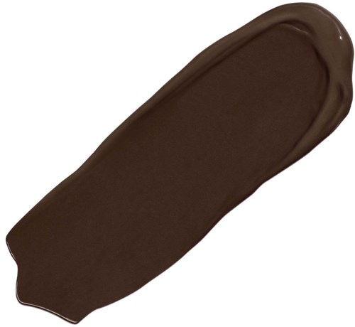 En mörkbrun utstrykning av någon form av kräm eller färg, utbredd i en avlång form.