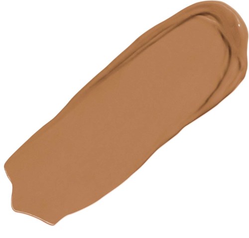 En prov på ljusbrun kosmetisk grundfärg eller concealer med en slät, krämig konsistens.