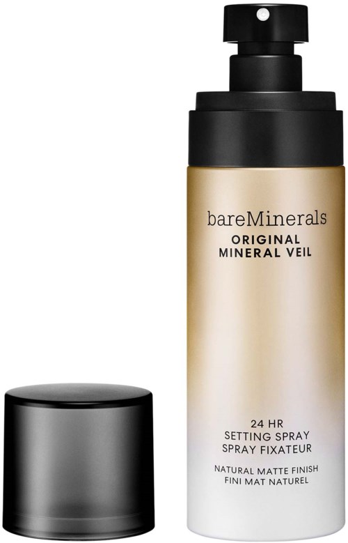 A beige and black spray bottle labeled 'bareMinerals,' with a black cap nearby. It is a setting spray for makeup.