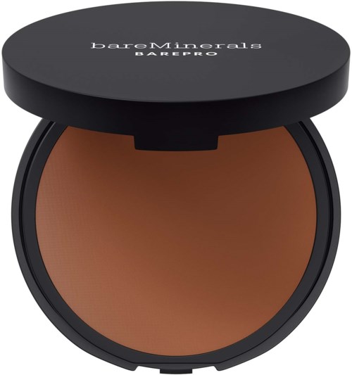 A round makeup compact with brown powder and a black lid with white text reading 'bareMinerals BAREPRO.'