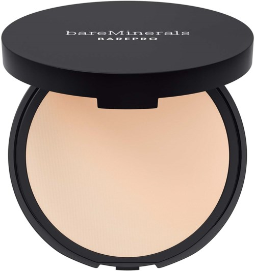 Pyöreä, musta rasia, jossa on kansi, sisältää vaaleanväristä kiinteää jauhetta, lukee 'bareMinerals BAREPRO' päällä.