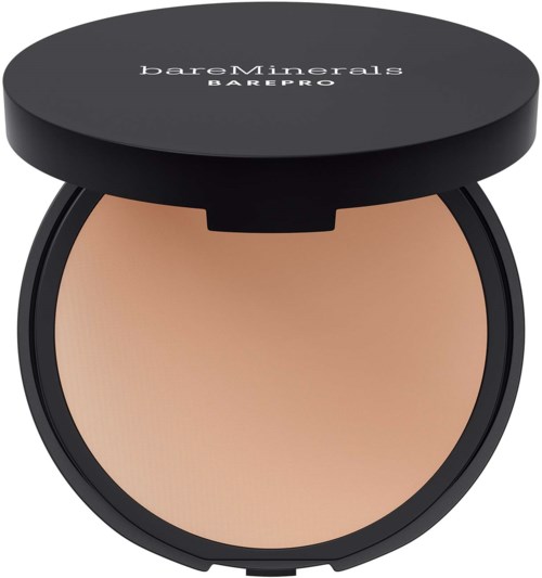 A round compact with a black lid labeled 'bareMinerals BAREPRO' and beige powder inside.
