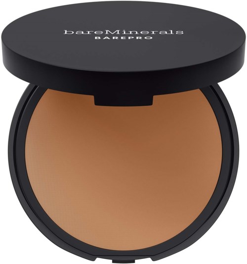 A round compact with a black lid and the brand name 'bareMinerals BAREPRO' on top. Inside is a brown powder.