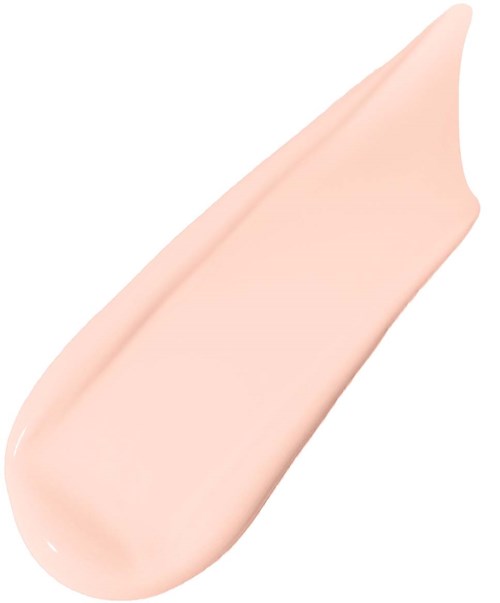 Ett ljust rosa, krämigt ämne med en slät textur, formad som ett tårdroppe eller avlång droppe.