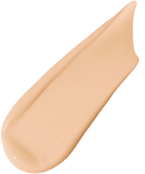 Ett sample av beige flytande foundation med en slät, krämig konsistens och en något spetsig spets.