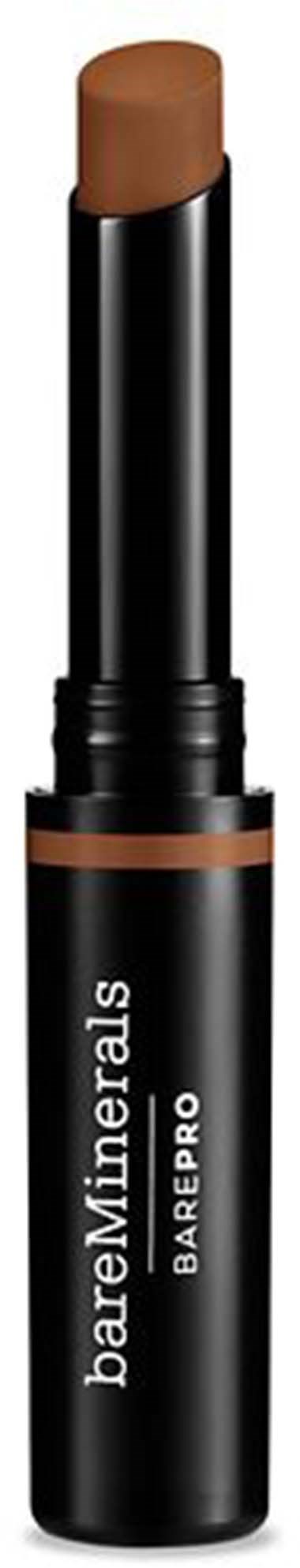 En brun kjepp makeupprodukt med svart tube merket "bareMinerals BAREPRO".