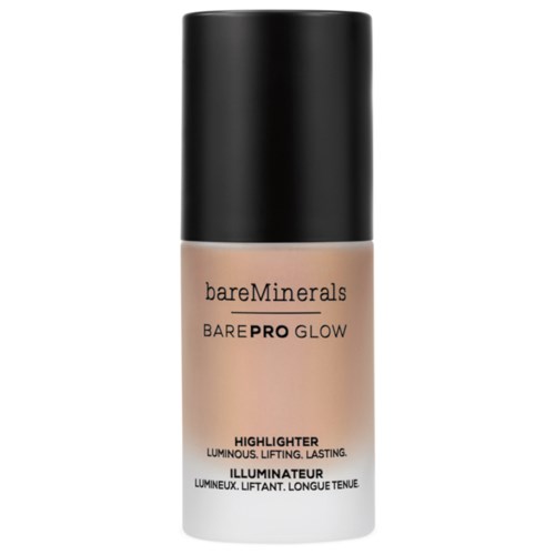 En beige foundationflaske med svart hette og 'bareMinerals'-logo, merket 'BAREPRO GLOW' og 'Highlighter Luminous, Lifting, Lasting'.