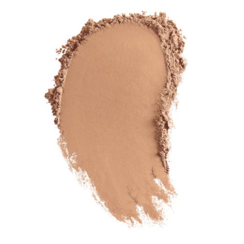En streck av beige pulver, med ojämna kanter, på en vit bakgrund.