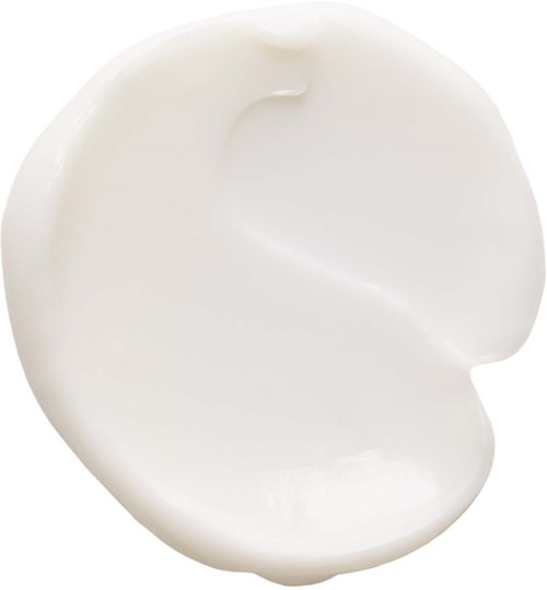 Vit kräm eller lotion i en liten rund behållare, jämn textur, fyller mesta delen av rummet.