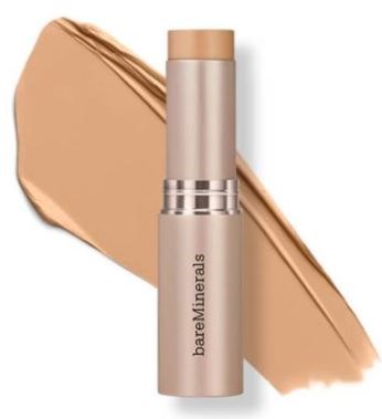 A beige stick of BareMinerals makeup with a swatch of foundation behind it.