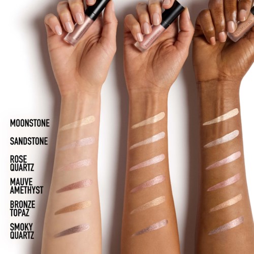 Swatchar av sex olika makeupfärger på tre armvågar med etiketter: Moonstone, Sandstone, Rose Quartz, Mauve Amethyst, Bronze Topaz, Smoky Quartz.
