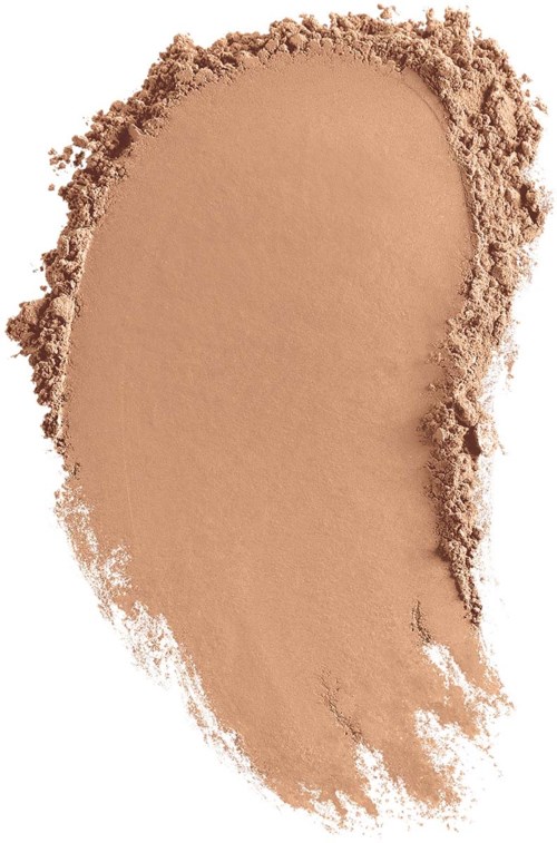 Beige jauhe levittymättömästi epätasaisesti, terävät reunat ja irtonaisia hiukkasia.